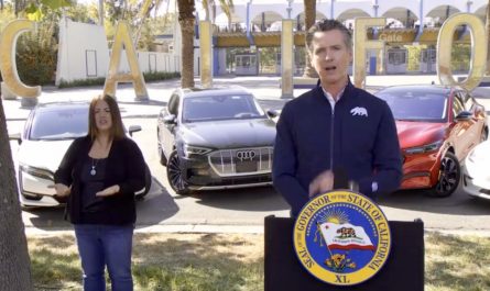 California Governor Gavin Newsom stands in front of the letters once outside Disney California Adventure