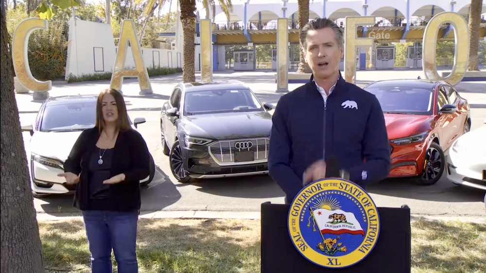 California Governor Gavin Newsom stands in front of the letters once outside Disney California Adventure