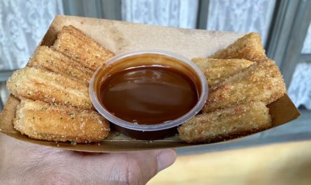 Christmas Churro with dipping sauce found at Pecos Bill Tall Tale Inn and Cafe