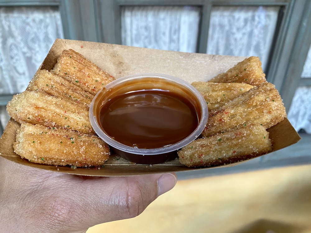Christmas Churro with dipping sauce found at  Pecos Bill Tall Tale Inn and Cafe