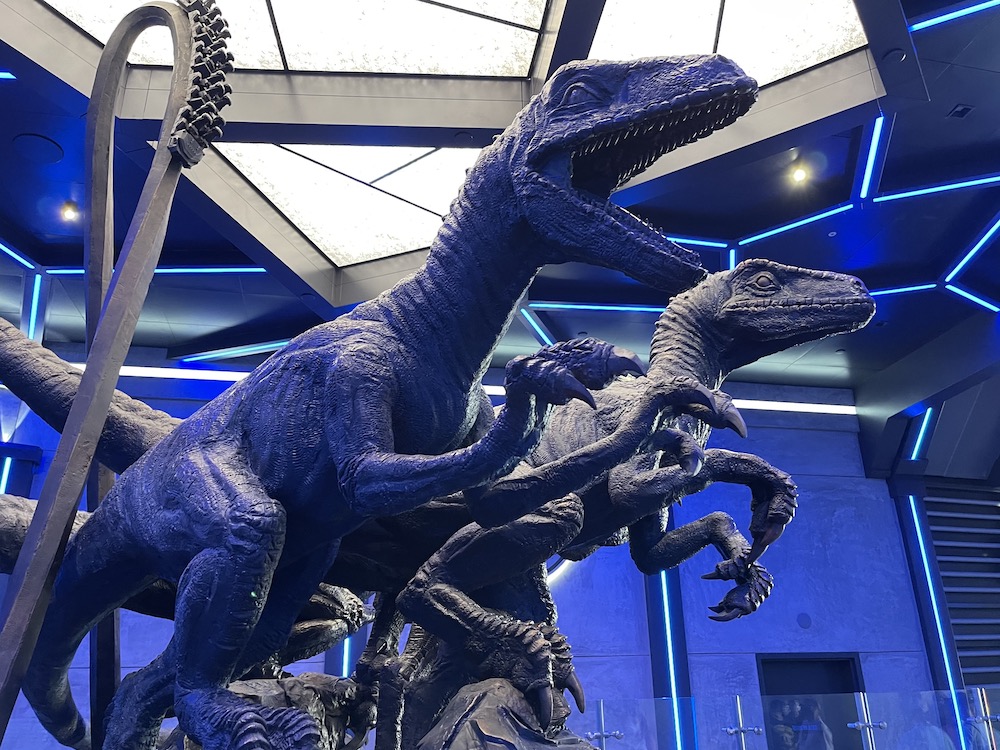 Jurassic World VelociCoaster raptor statue